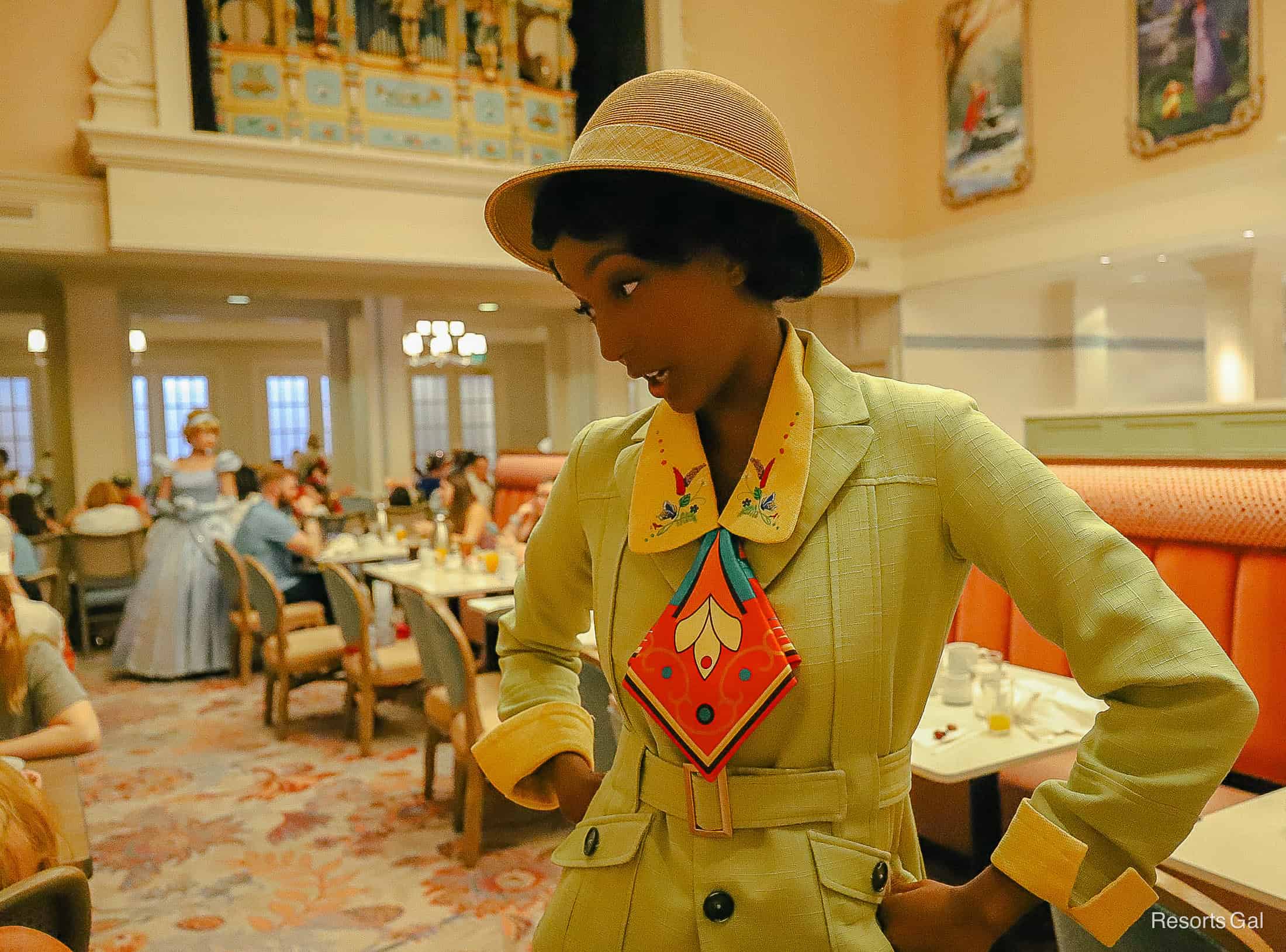 Tiana talking to a guest at 1900 Park Fare character breakfast at Grand Floridian. 