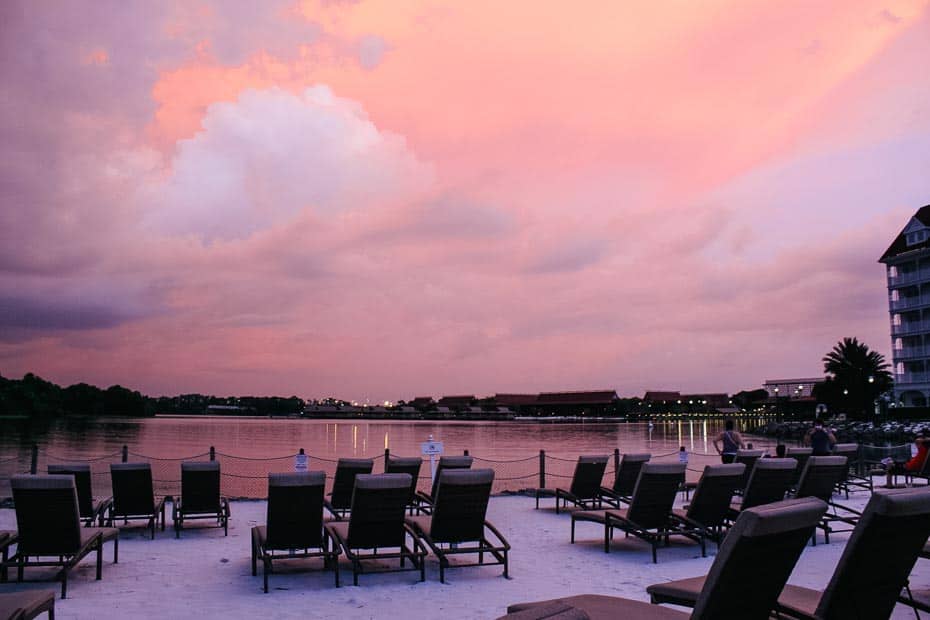 a pretty sunset at the Grand Floridian where the sky is nearly entirely pink 