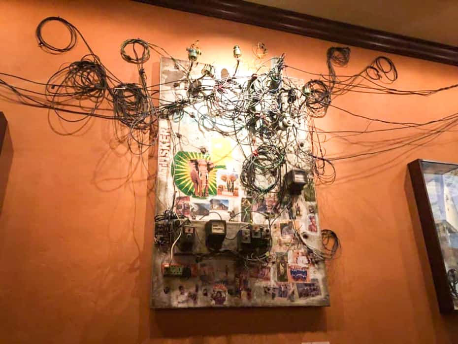 a piece of artwork with a wire sculpture in Tiffins Restaurant