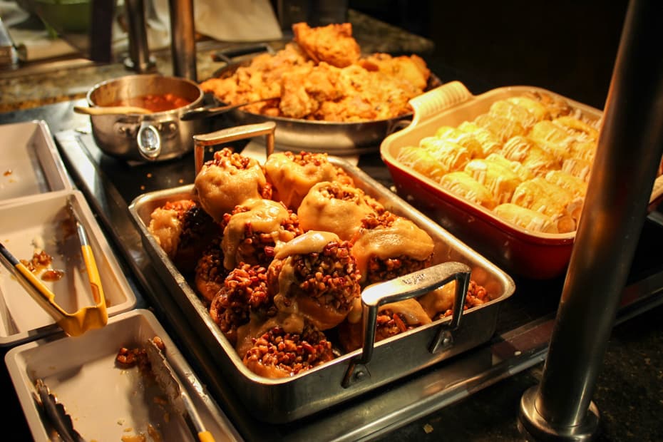 a tray of sticky buns at Boma 