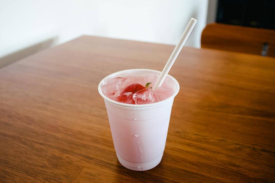 a cup with a refresher style pink drink