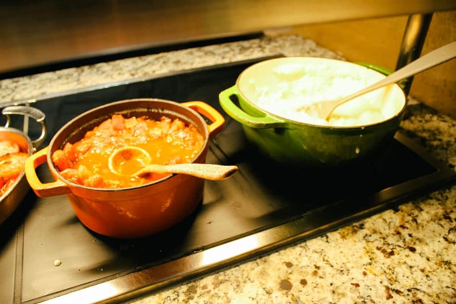 a dish of spicy tomato stew and pap