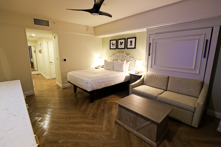 Room has one queen bed and one queen sleeper that pulls down from the wall. 