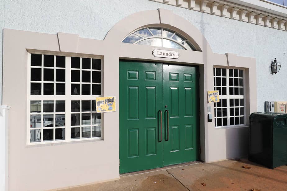 green double doors that lead to the laundry room in The Mansions at Port Orleans Riverside 