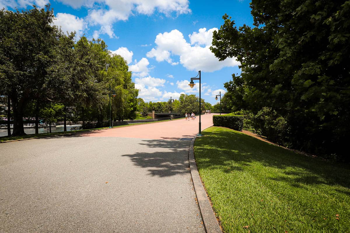 an incline that leads to the bridge by Epcot's International Gateway