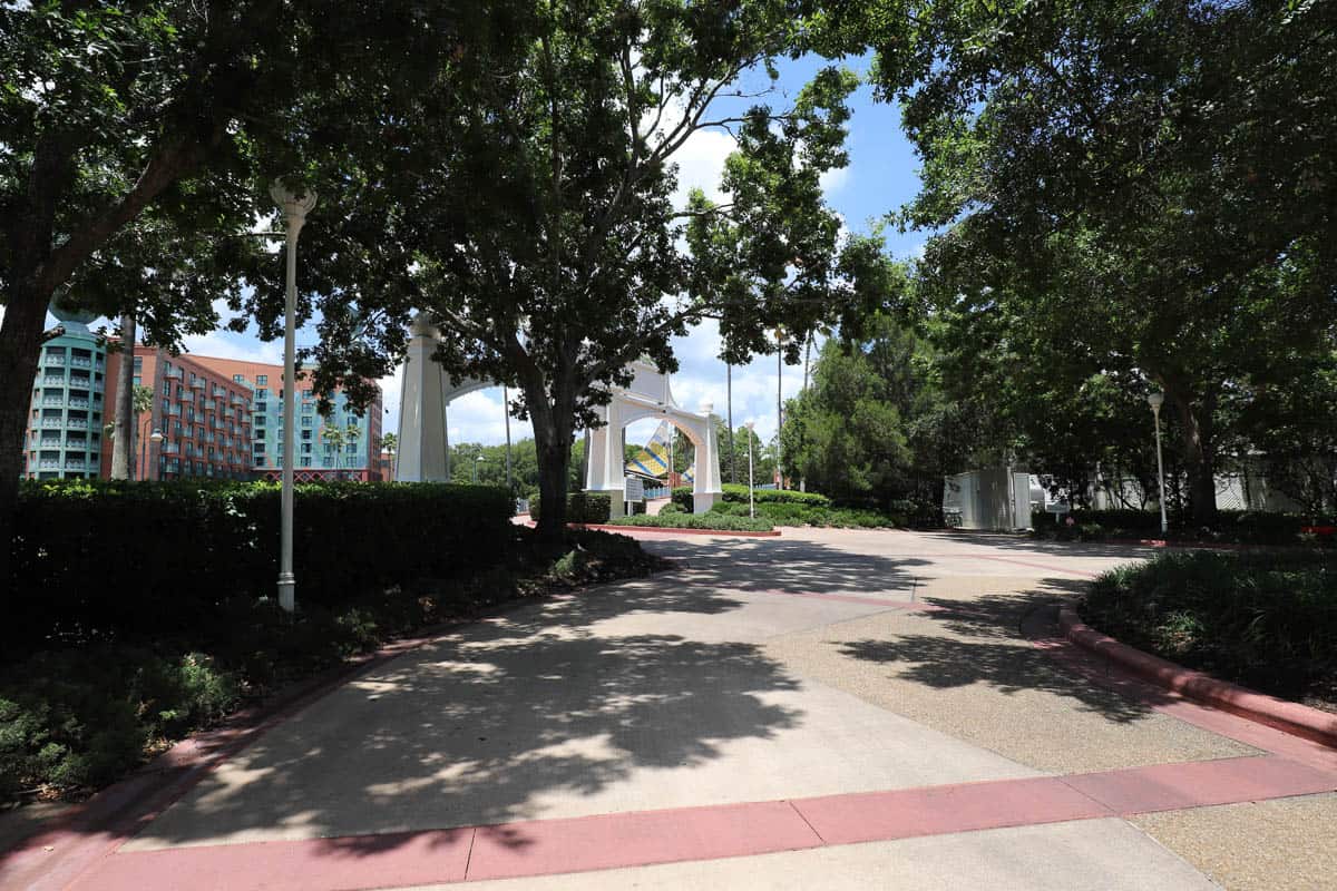 the sidewalk that leads up to the bridge that continues to the left for Swan and Dolphin or the right for Yacht and Beach Club 