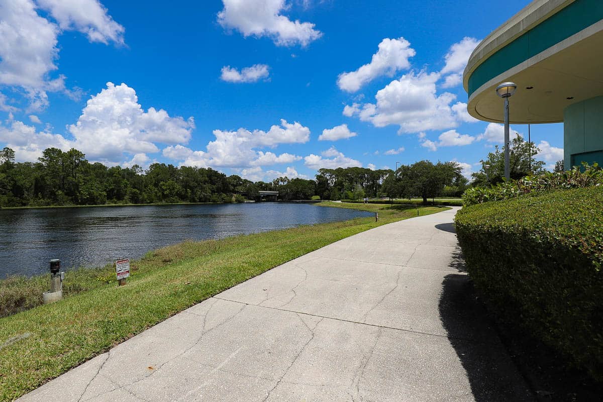 A closer look at the sidewalk with the waterway to the left of it. 