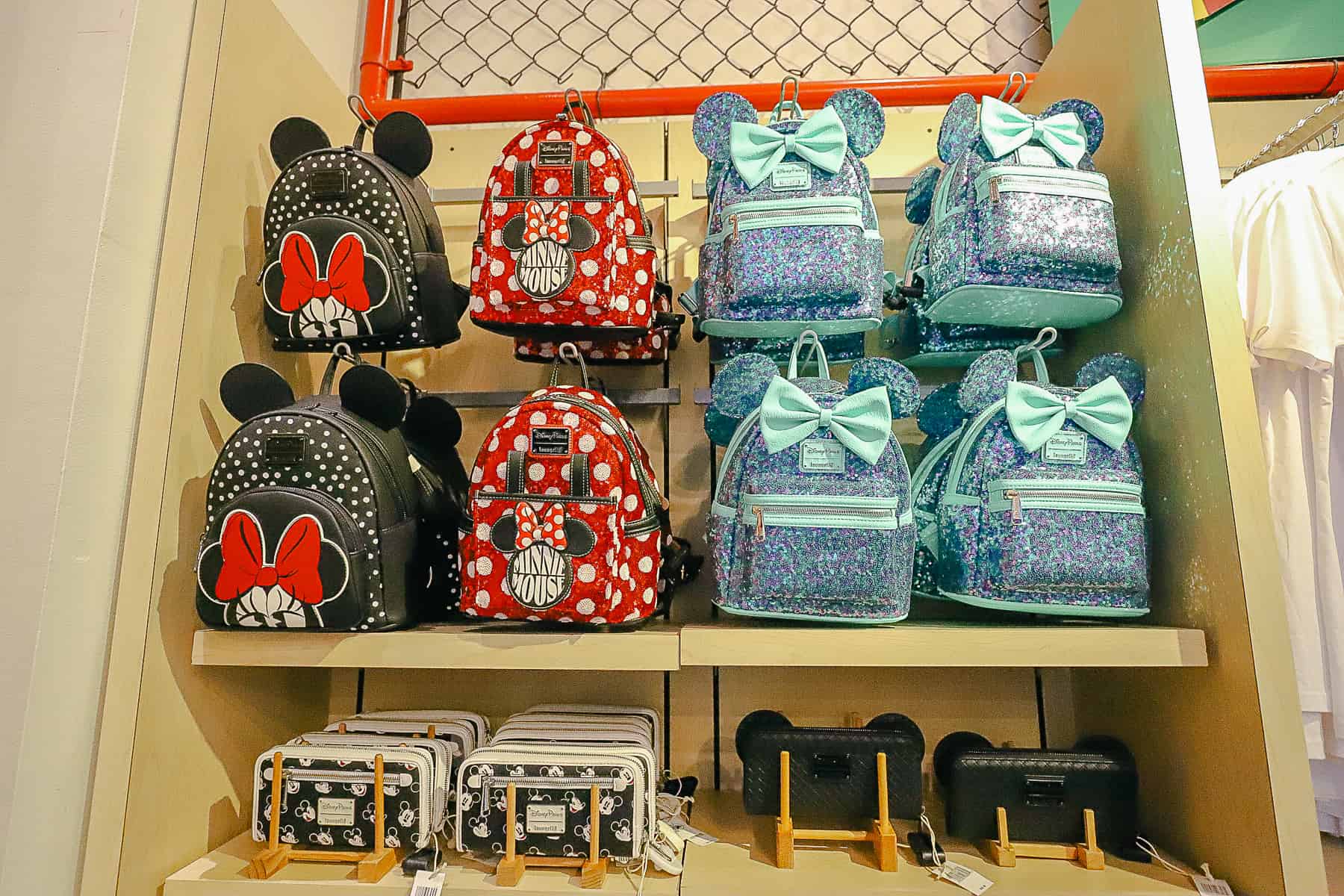 a display with Loungefly backpacks and wallets at Sport Goofy Gifts 