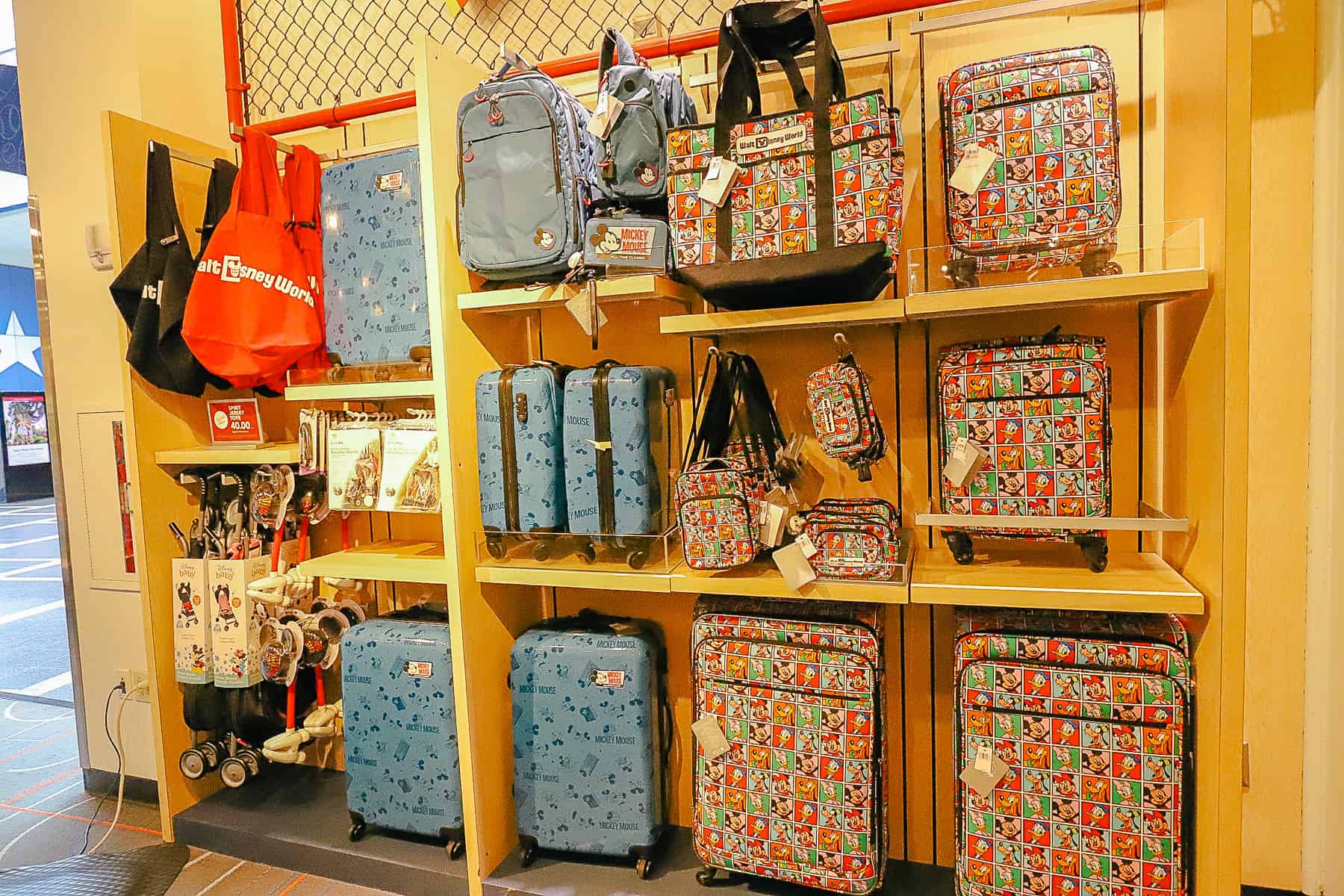 a display of luggage and other travel accessories at Sport Goofy Gift Shop