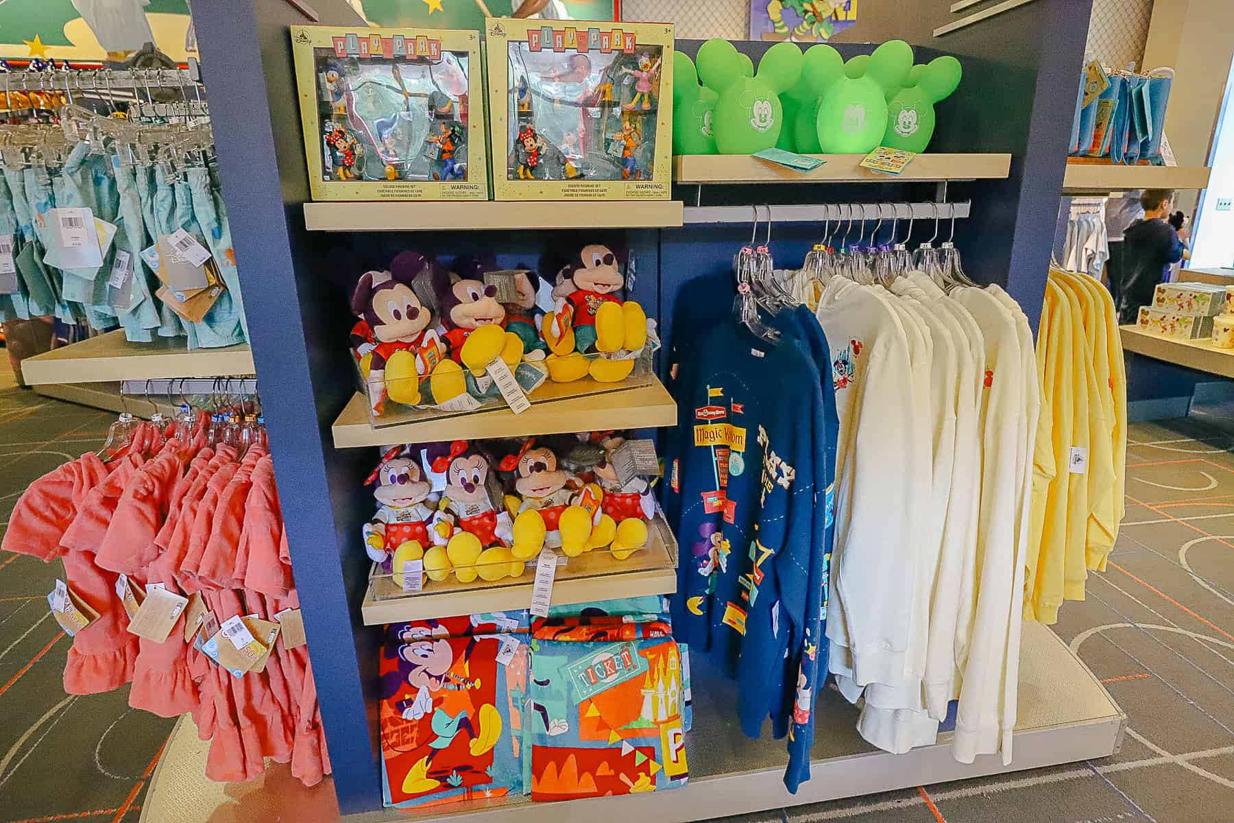 merchandise display with plush Mickey and Minnie 