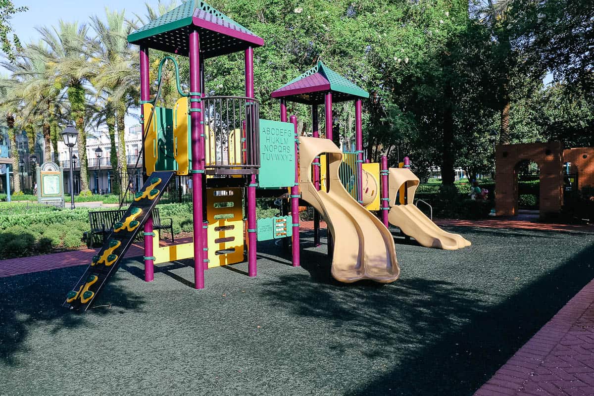 a purple, green, and yellow playground at Port Orleans French Quarter 