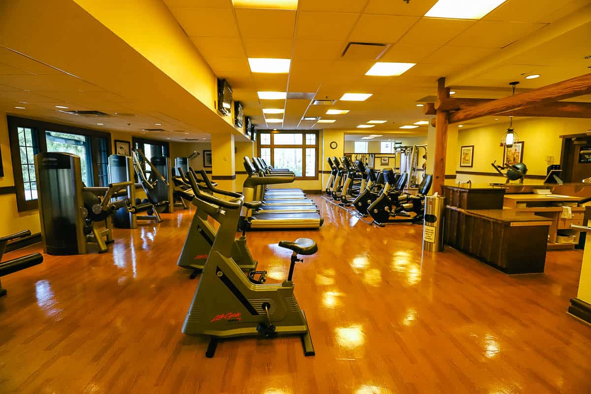 Wilderness Lodge fitness center interior with various machines 