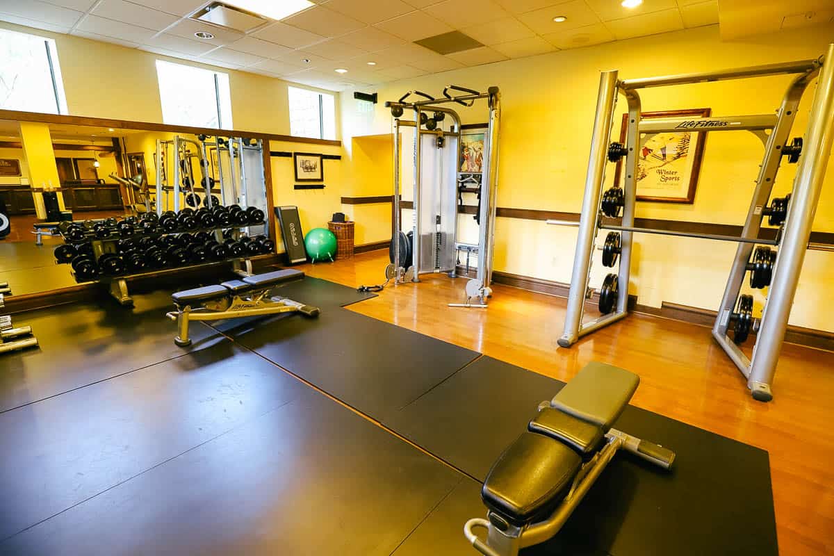 a corner in the fitness center with weights 
