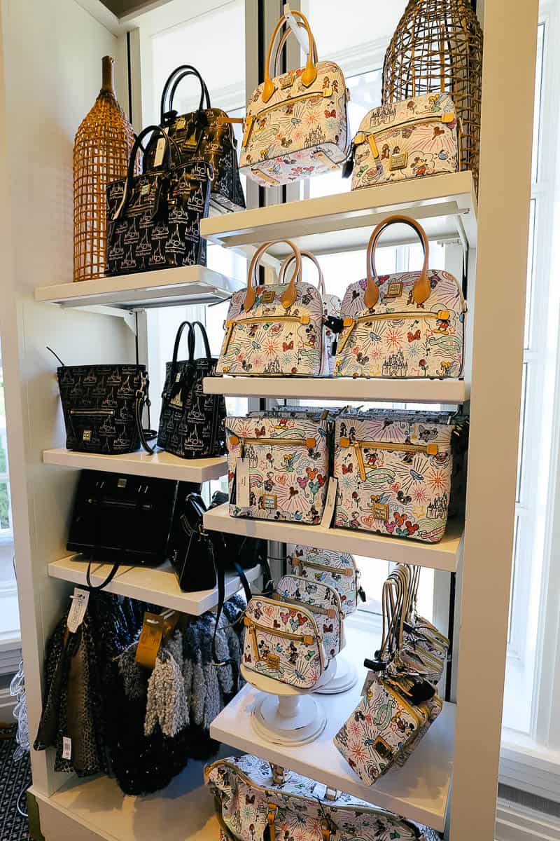 selection of Dooney and Bourke handbags inside the gift shop