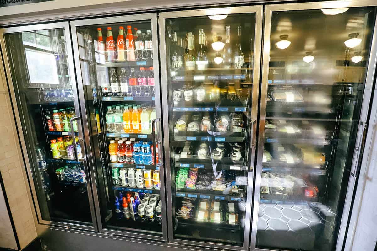 Refrigerated case with snacks and beverages for sale. 