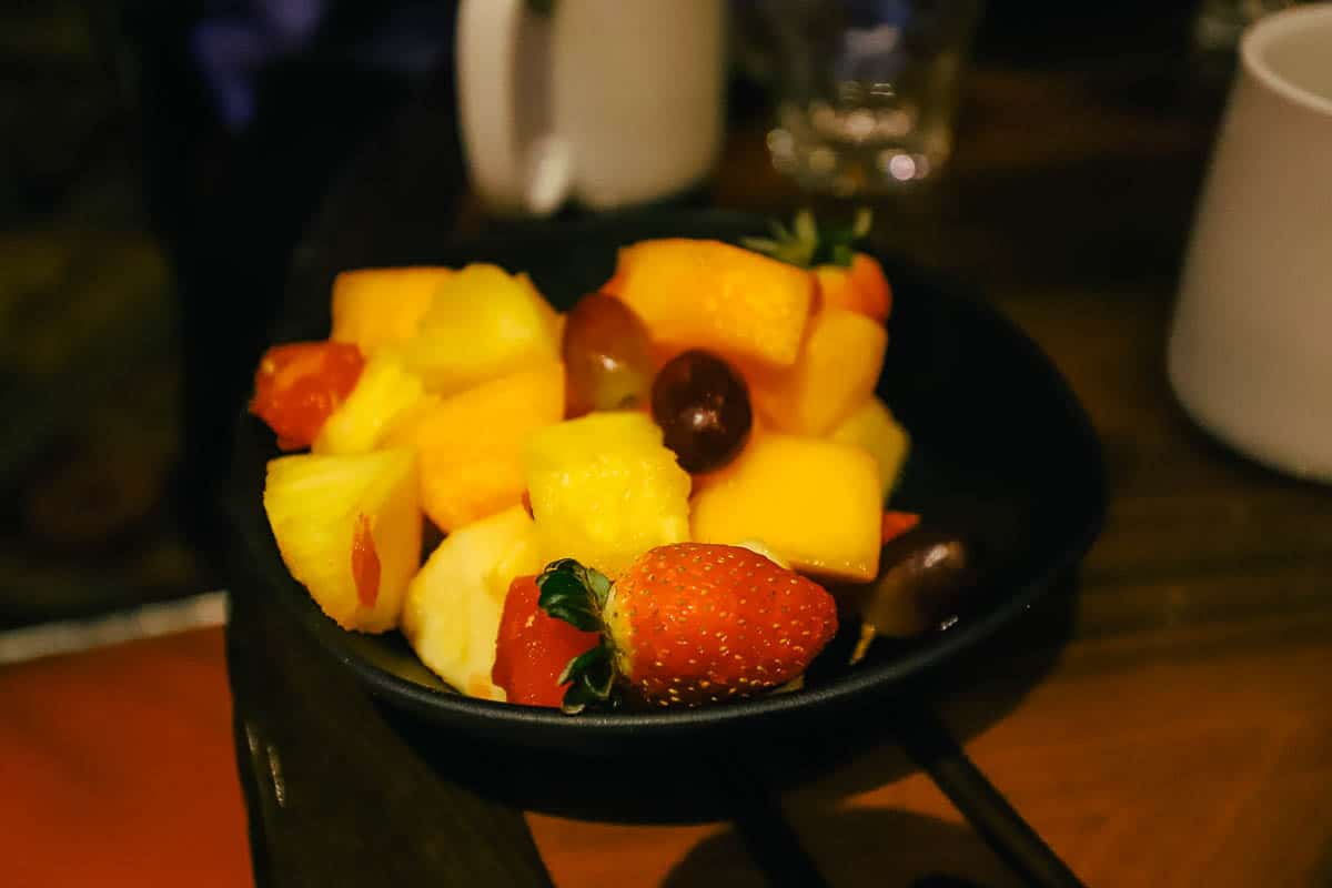 bowl of fruit brought to the table at the 'Ohana Best Friends Breakfast