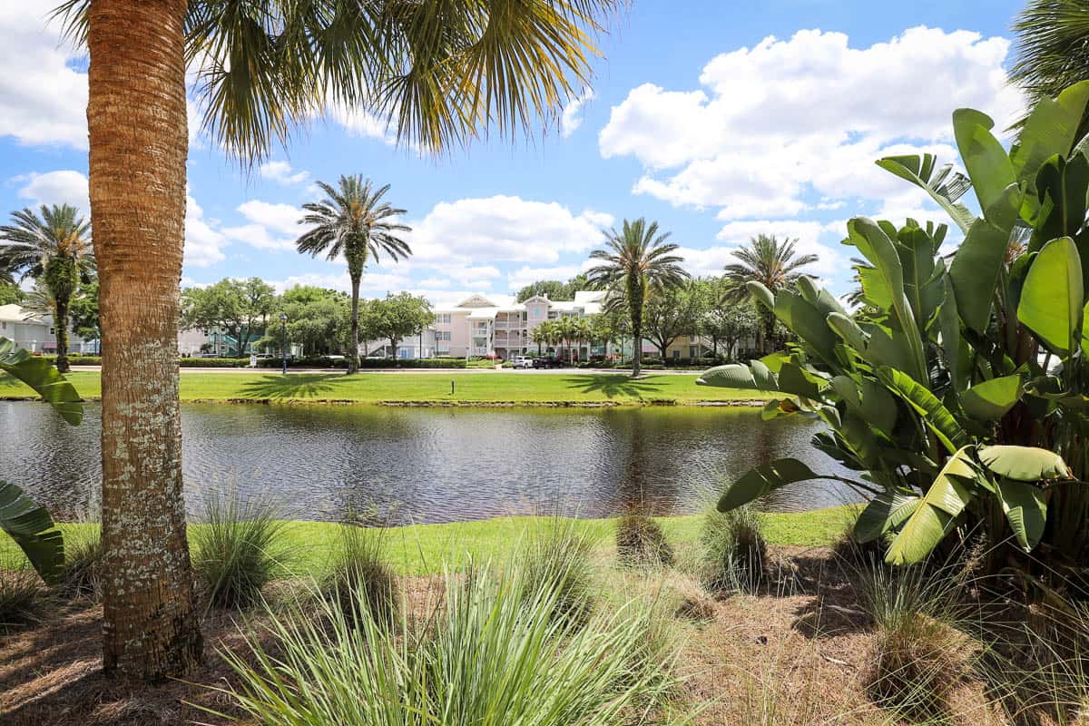 a scenic photo with a lake and Old Key West buildings in the background