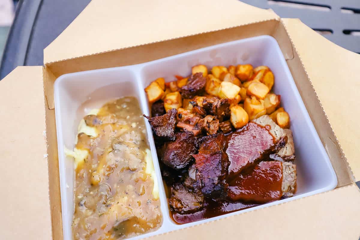 a to go order of the brisket with a side of mashed potatoes and gravy 