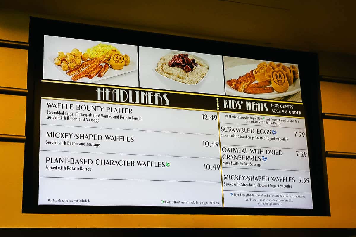 a menu board with items for breakfast like waffles and kids' meals at Disney's All-Star Movies 