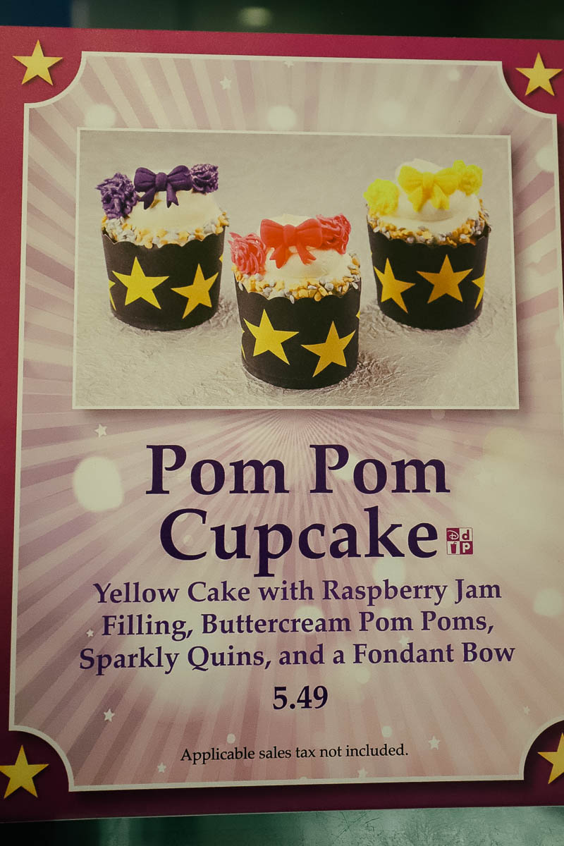 a sign with a special cupcake offering called the Pom Pom cupcake 