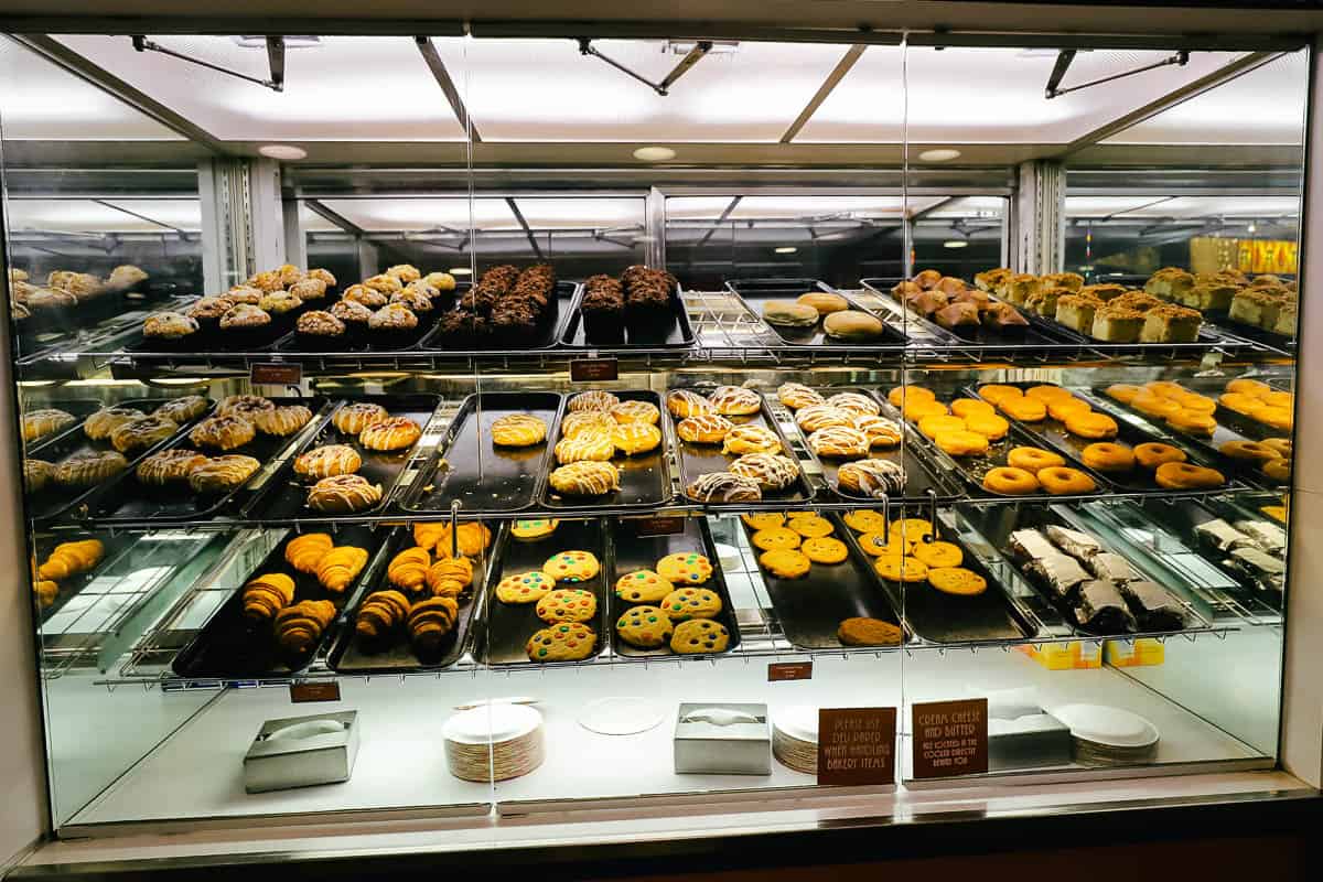 Pastry Case with muffins, donuts, cinnamon rolls, cookies, and croissants in World Premiere Food Court 