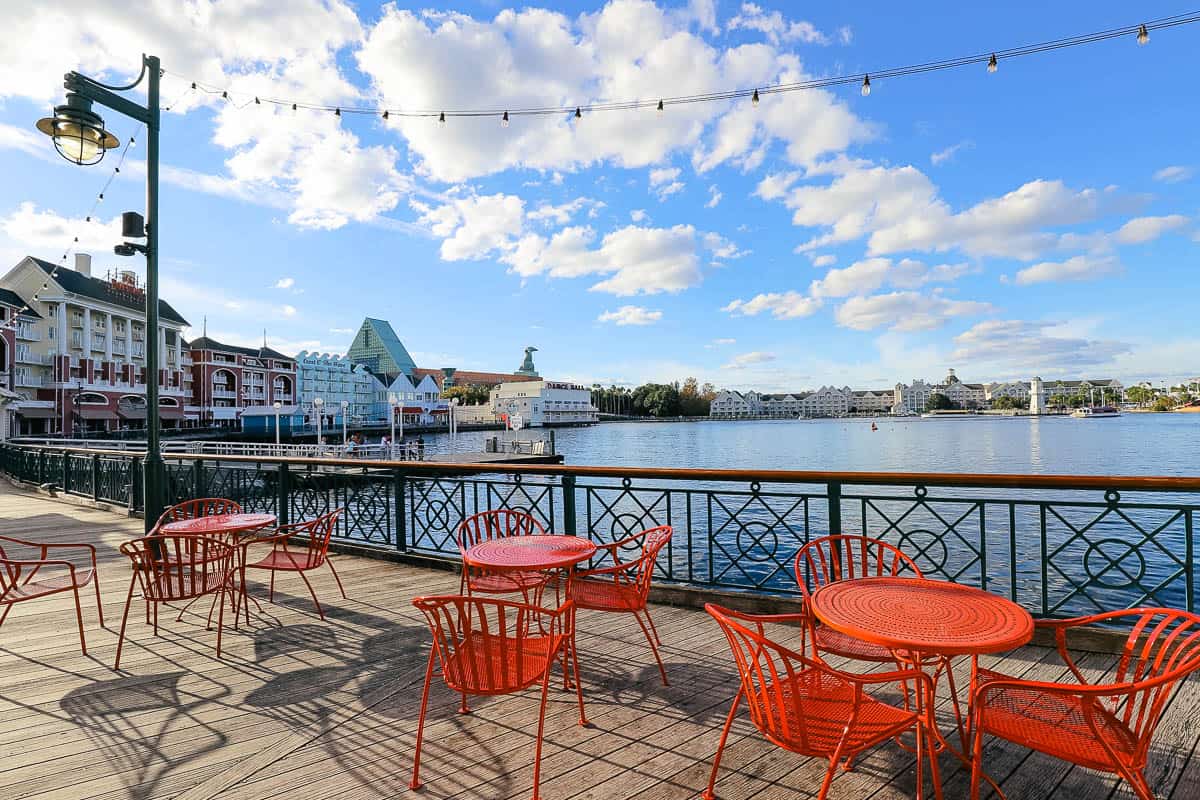 red tables and chairs sitting on the Boardwalk