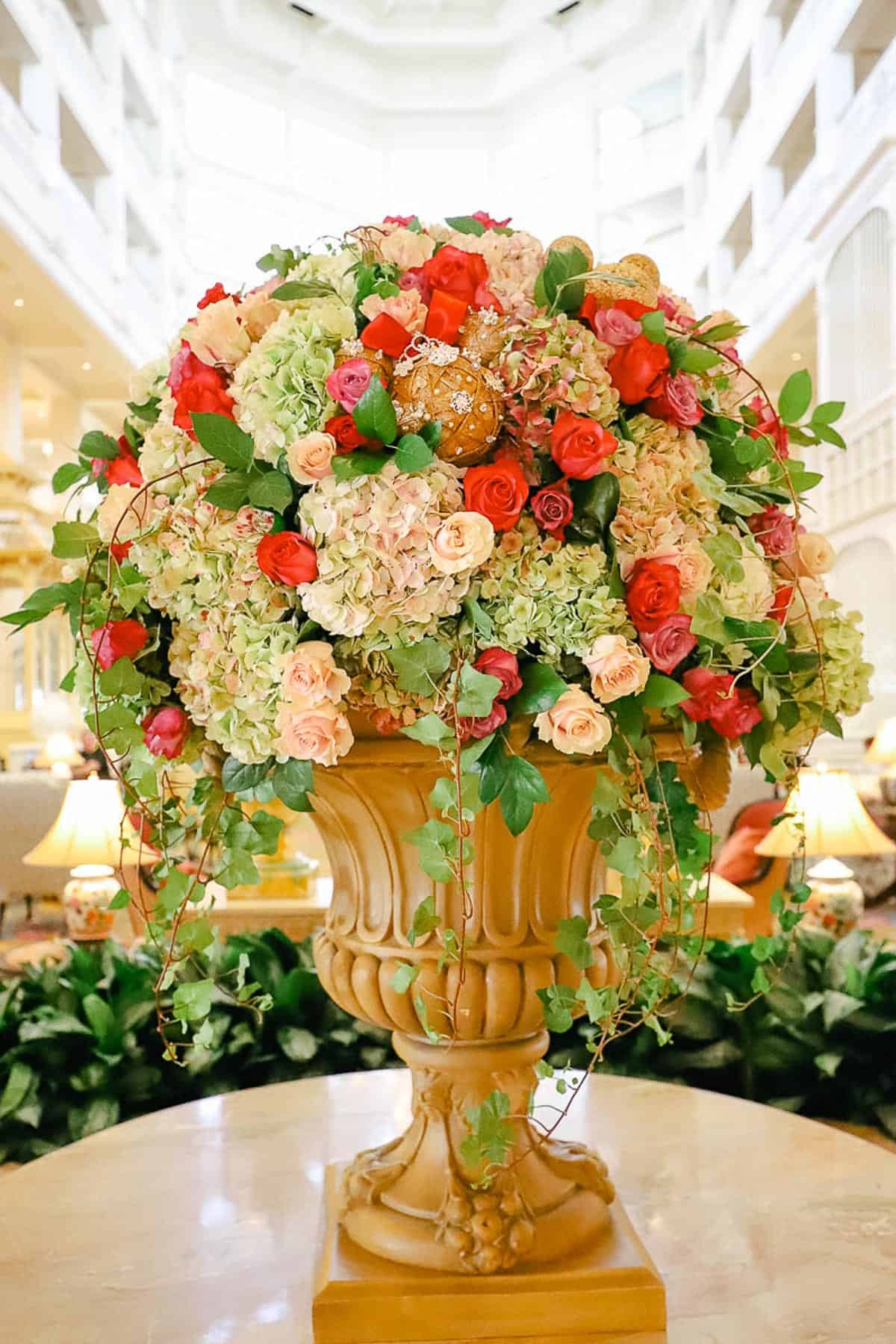 a vase of flowers at the entrance of Disney's Grand Floridian Resort