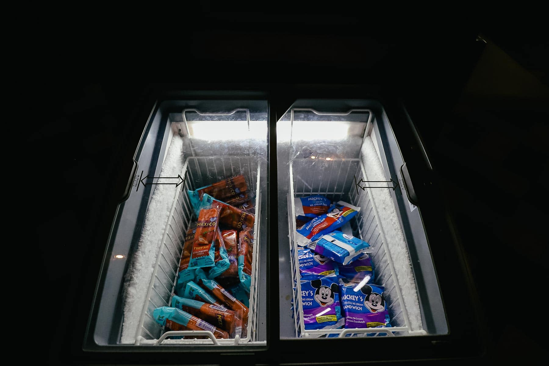 a freezer case with Mickey ice cream novelties and strawberry popsicles at Riverside Mill