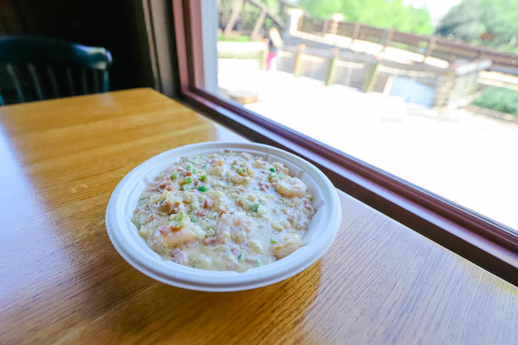a bowl of shrimp and grits 