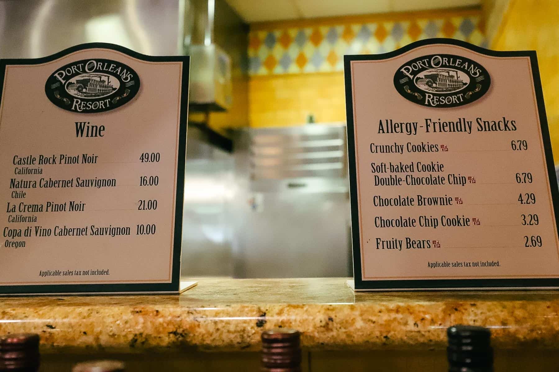 a display that lists the prices for allergy friendly snacks