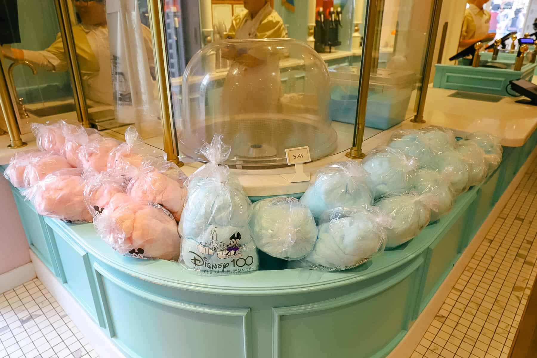 bags of blue and pink cotton candy in the Confectionery at Magic Kingdom