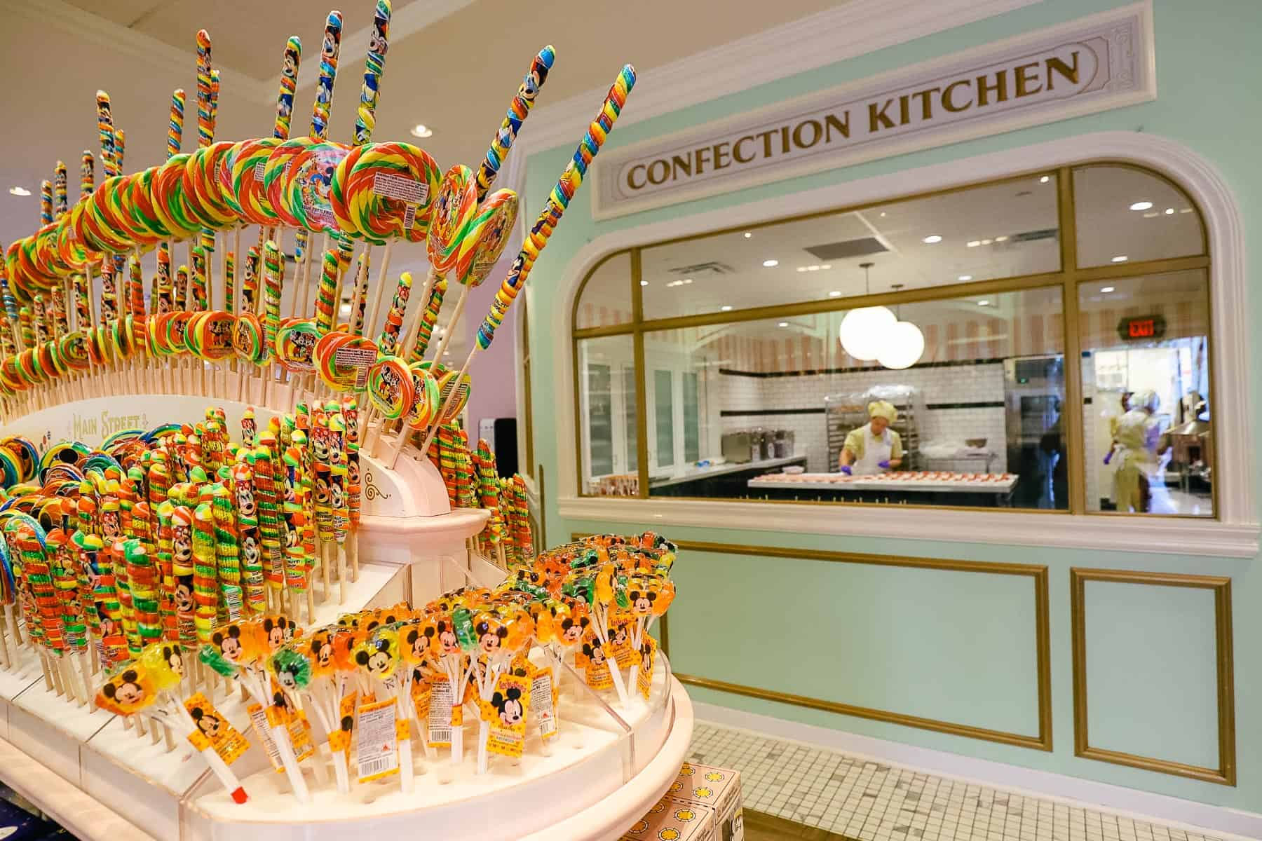 a window with a sign that reads Confection Kitchen