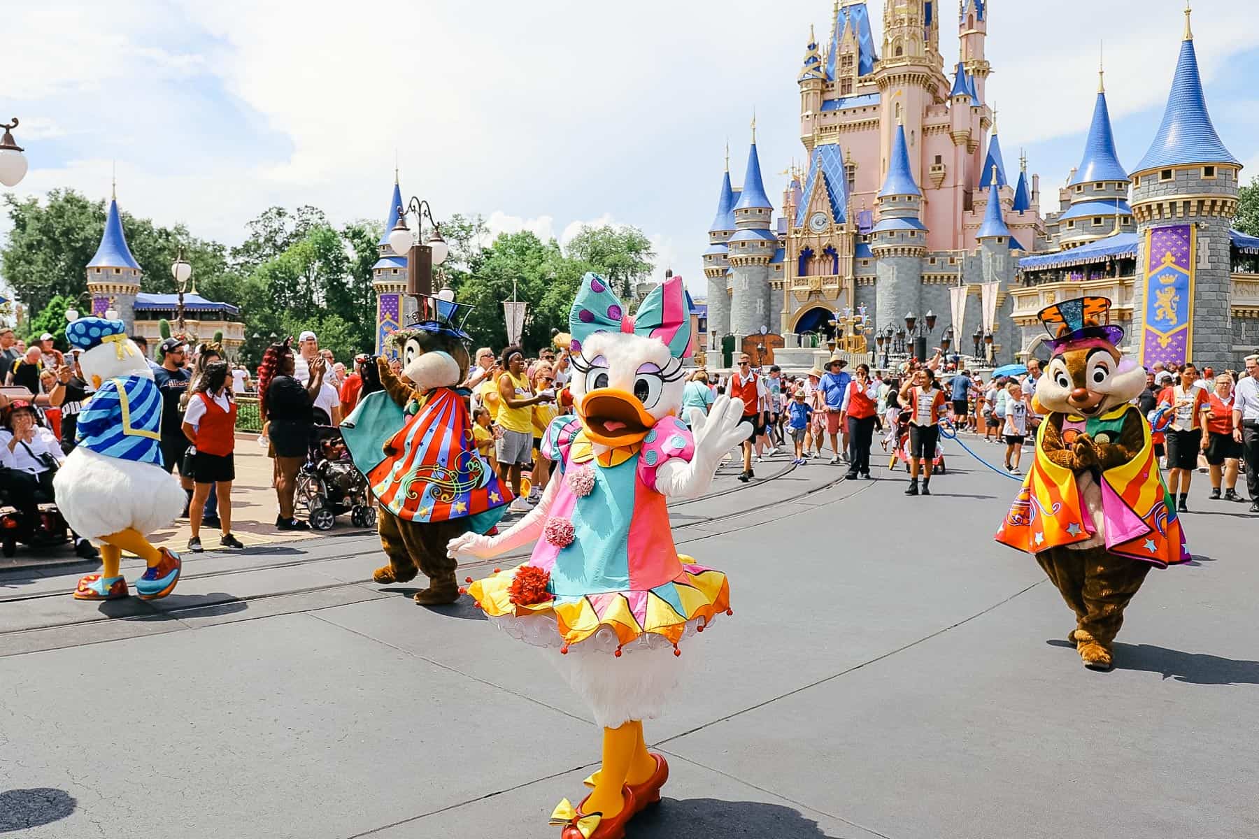 Chip and Dale walking in the Festival of Fantasy Parade 
