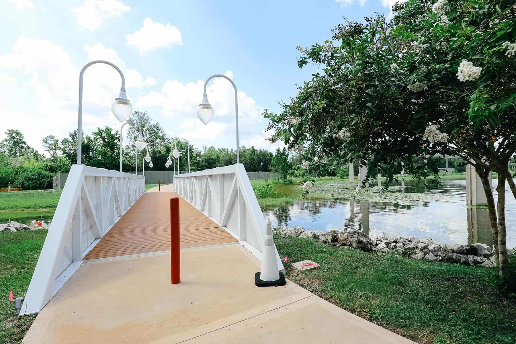 a bridge with white panels and lights 