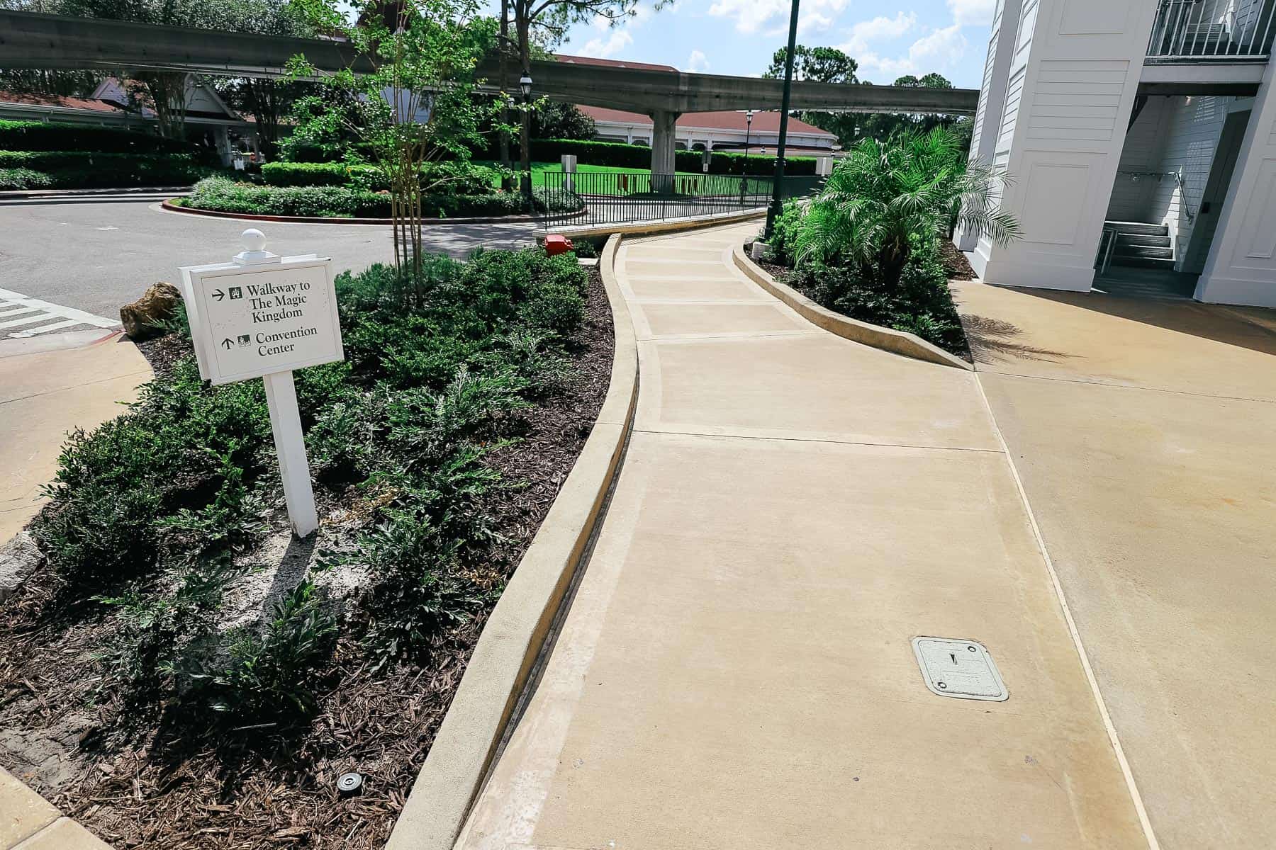 a directional next to Sago Cay that reads Walkway to the Magic Kingdom 