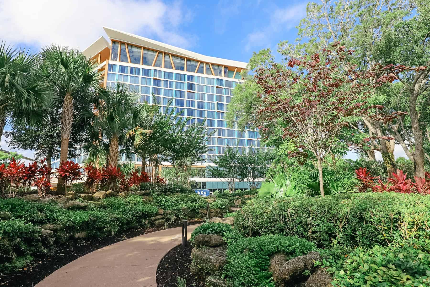 The Swan Reserve hotel sitting on a walkway across the street from the Swan and Dolphin.
