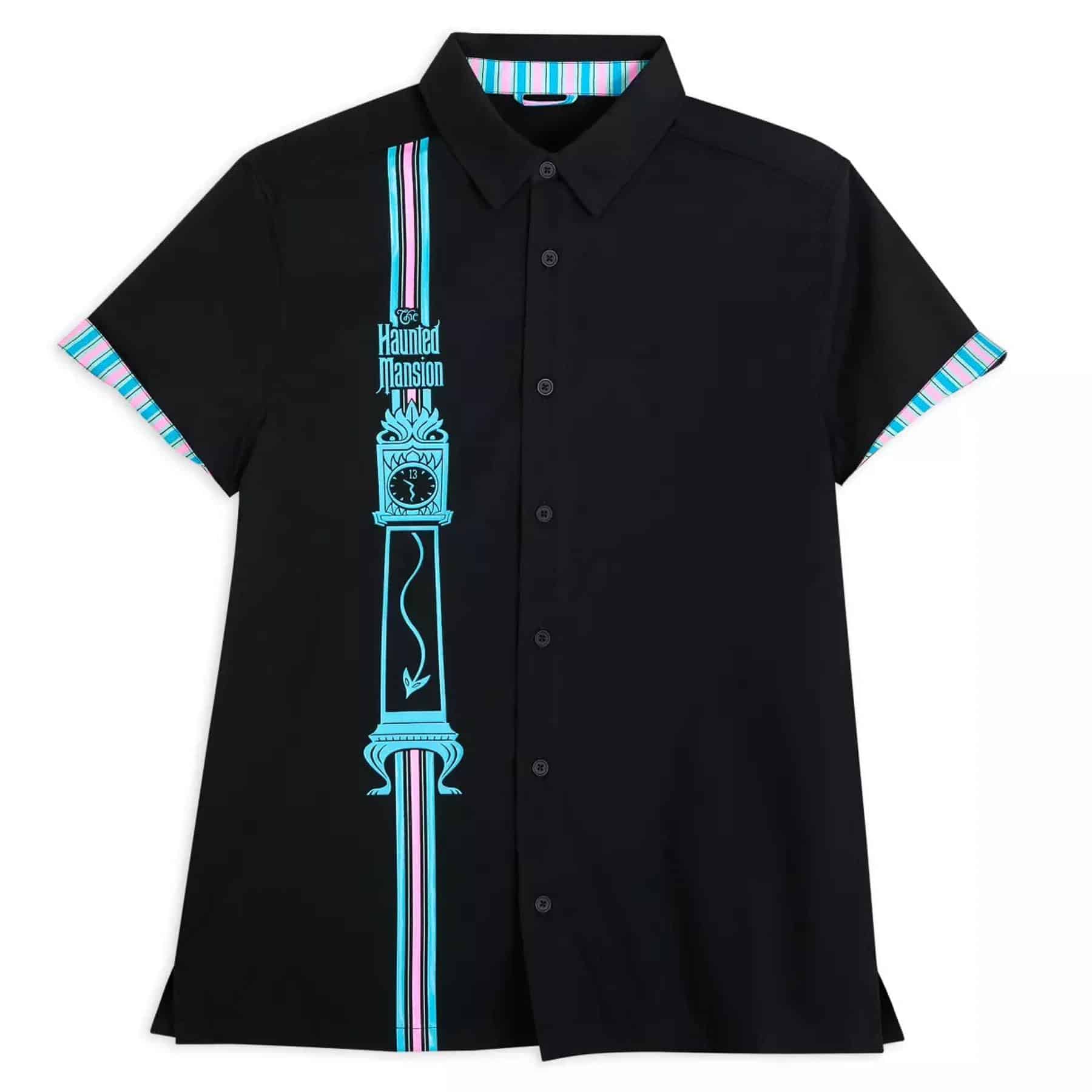 Black button up shirt that has the Haunted Mansion written in a stripe down one side with bright blue and pink stripes. 