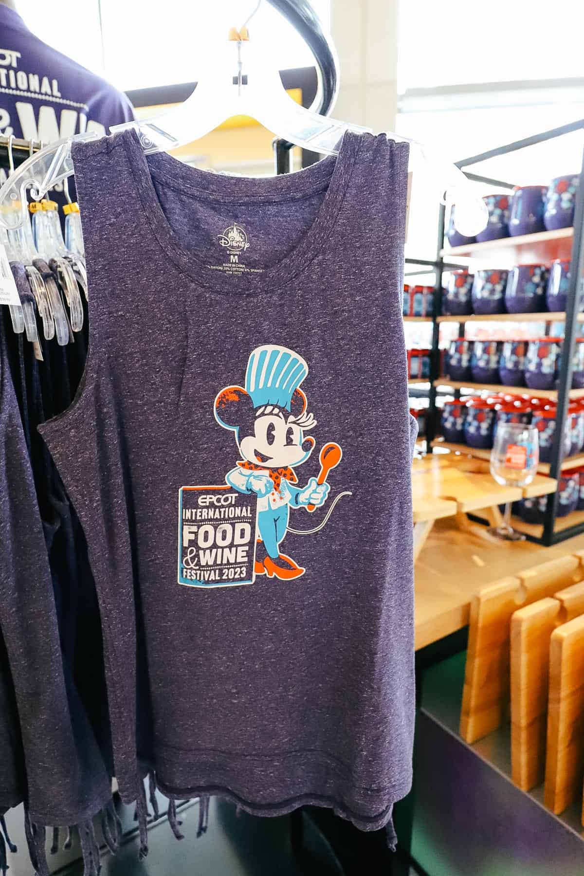 A tank top with Chef Minnie that says Epcot International Food and Wine Festival 2023. 