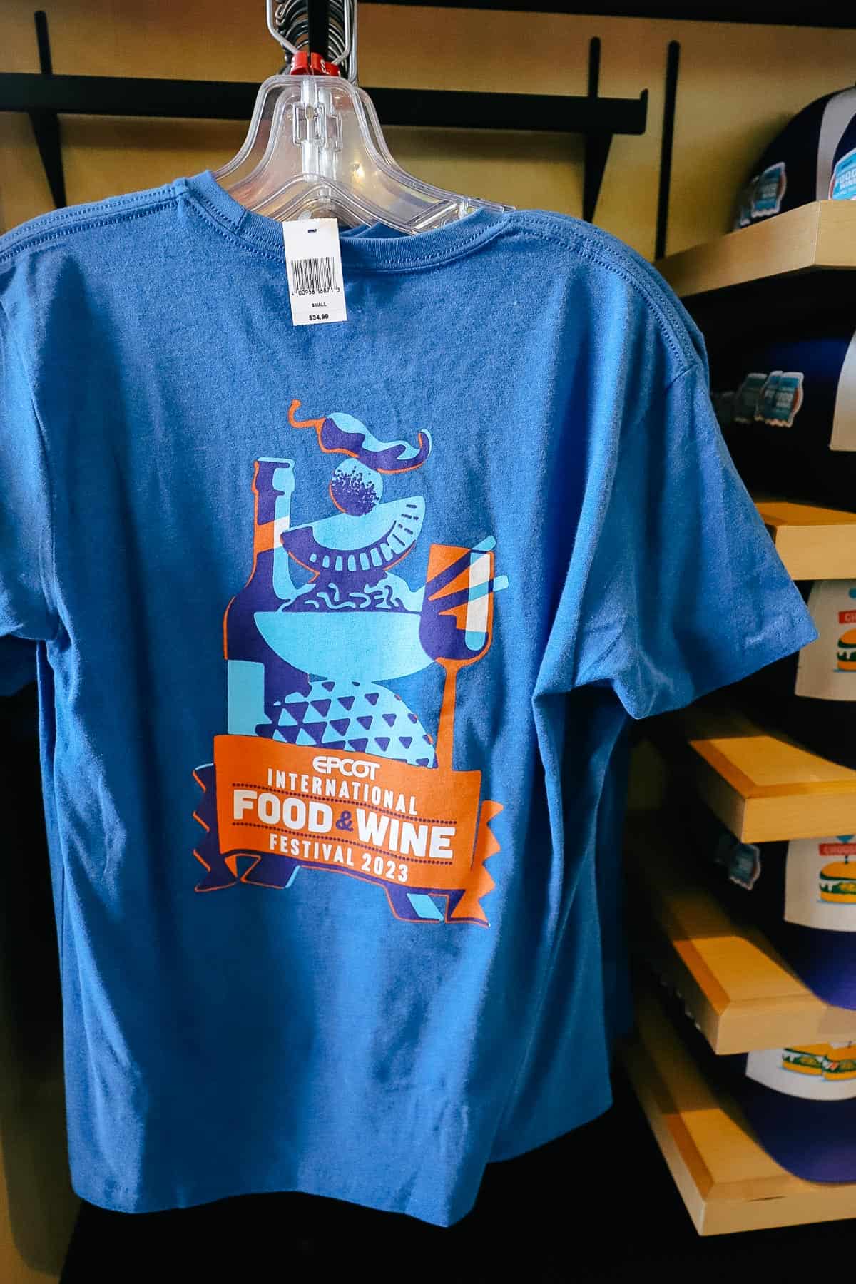 A t-shirt with Epcot Food and Wine 2023 on it. 