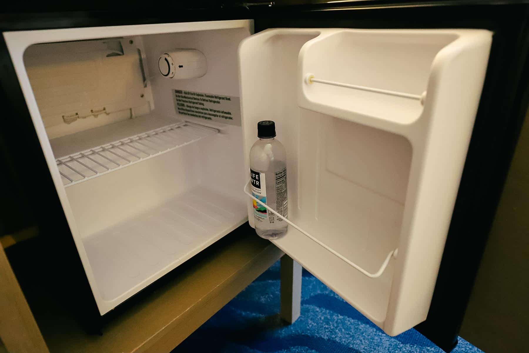 a mini fridge in the room
