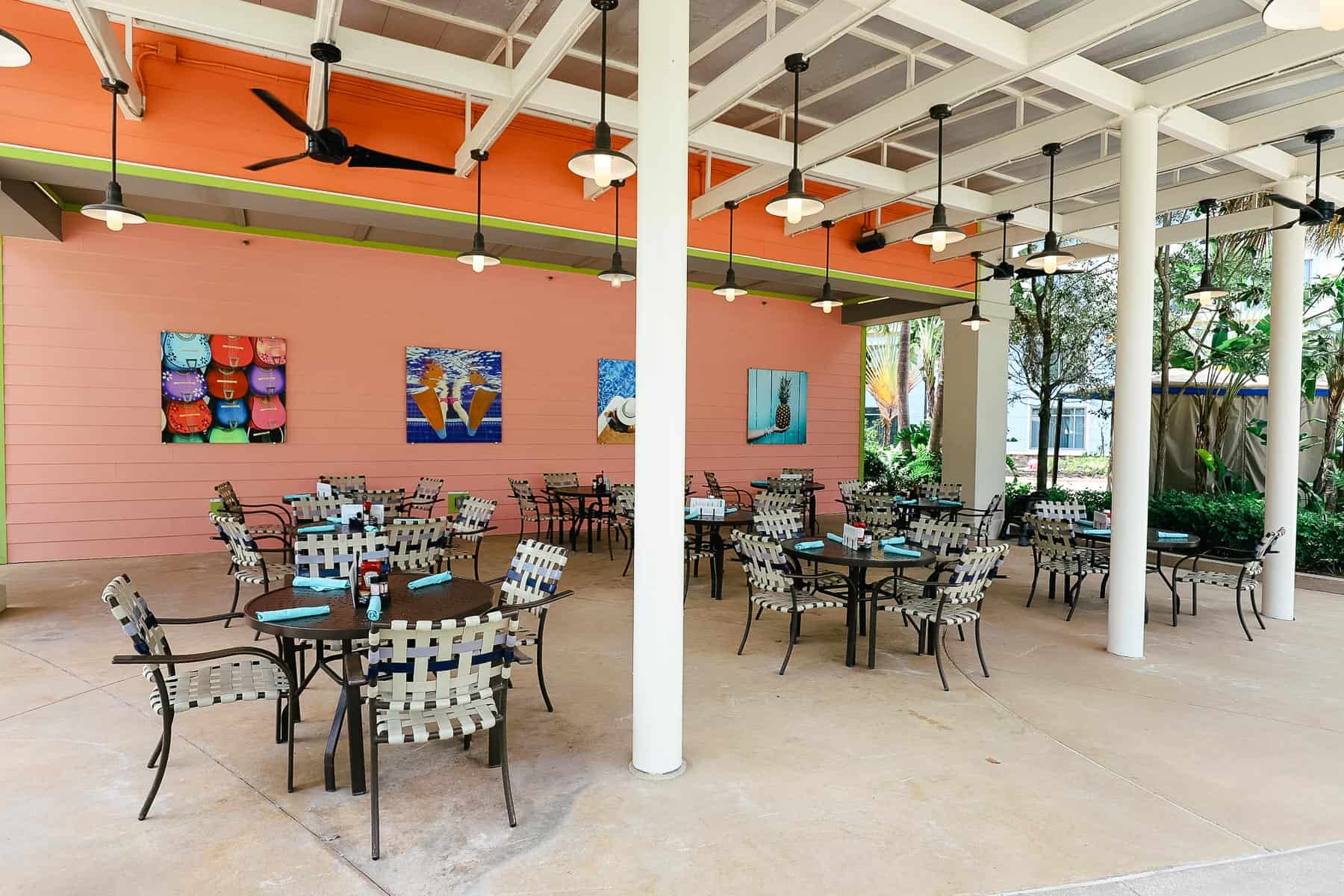 outdoor dining area near the pool at Loews Sapphire Falls