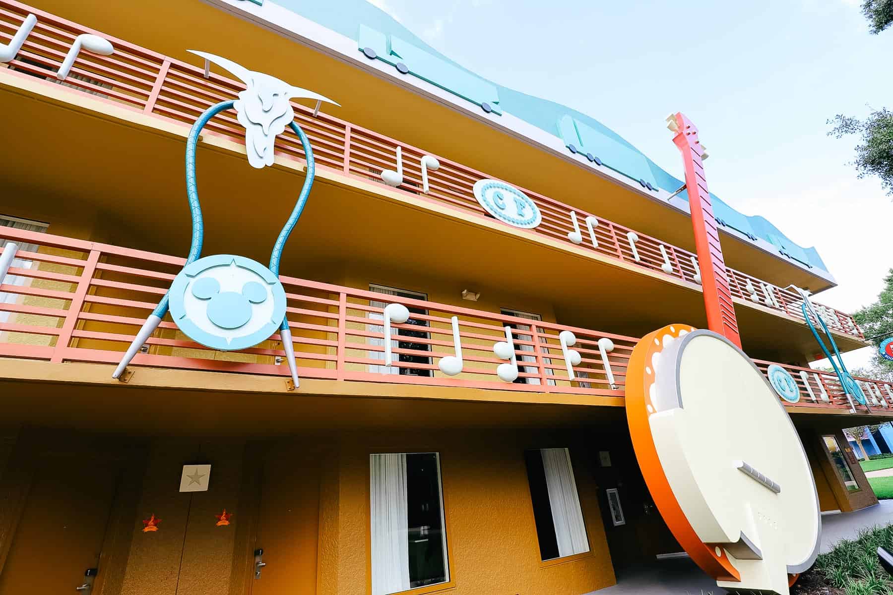 Railings on each floor feature banjos and hidden Mickey's in Country Fair. 