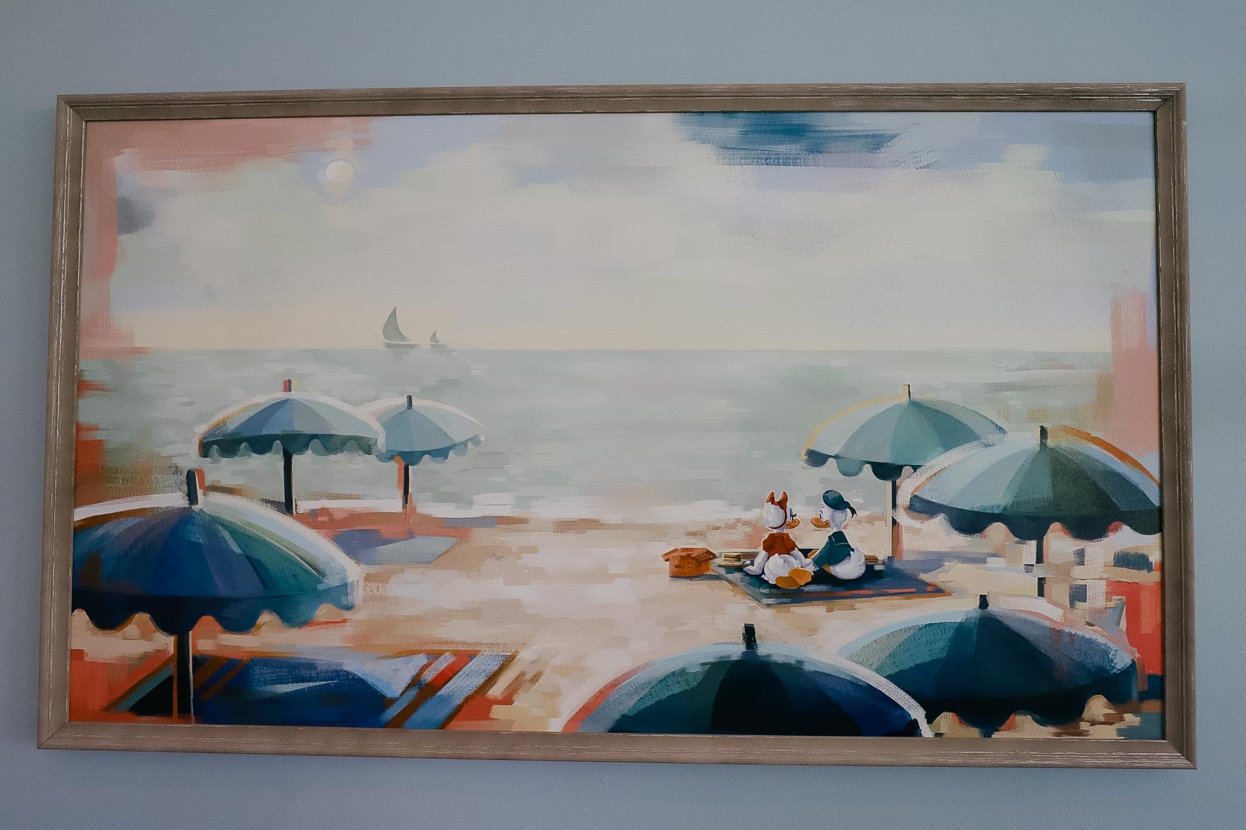 artwork featuring Donald and Daisy Duck on the beach 