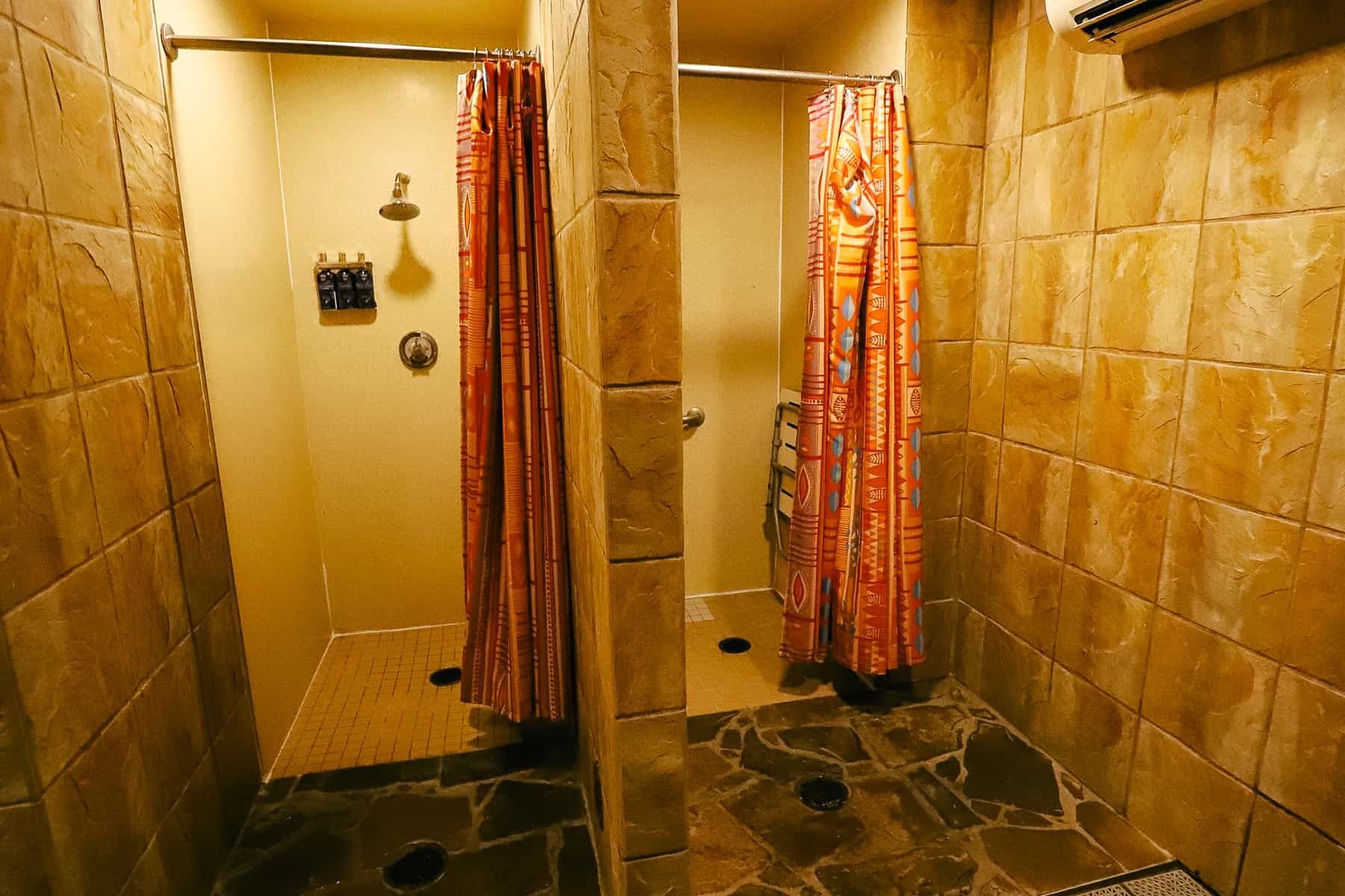 showers in changing area at Disney's Polynesian pool. 