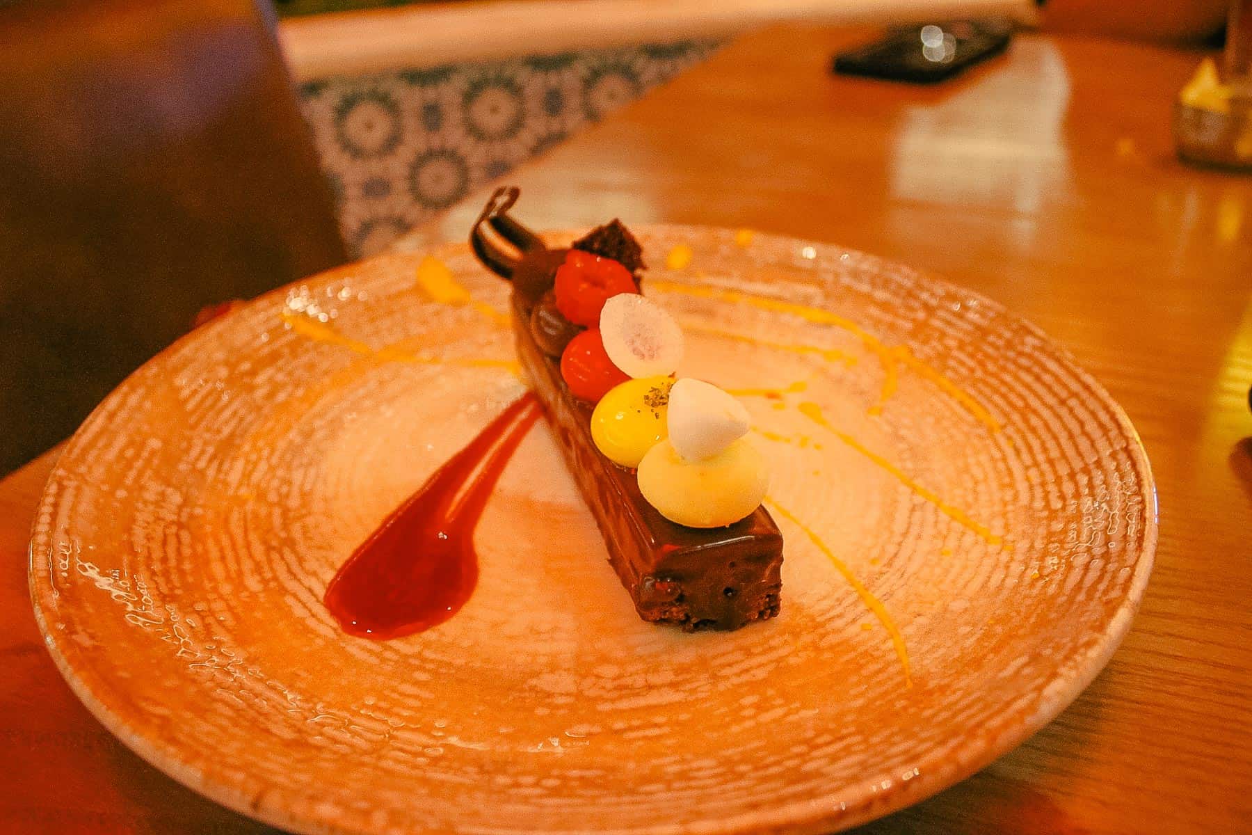 The Toledo Tapas Bar dessert tasting the flavors of Spanish Coffee, crunchy Chocolate, Raspberry Mousse and Lemon Curd
