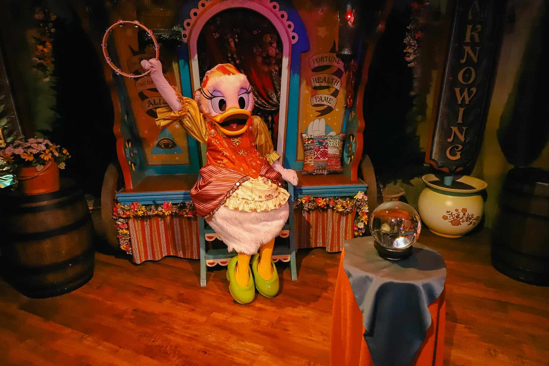 Daisy Duck with a bangle at her Magic Kingdom location. 