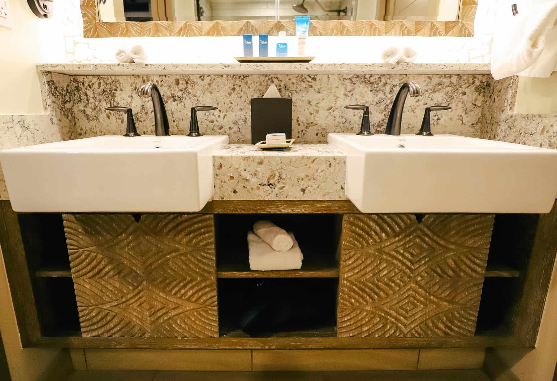 double sinks and vanity in Moana-themed rooms