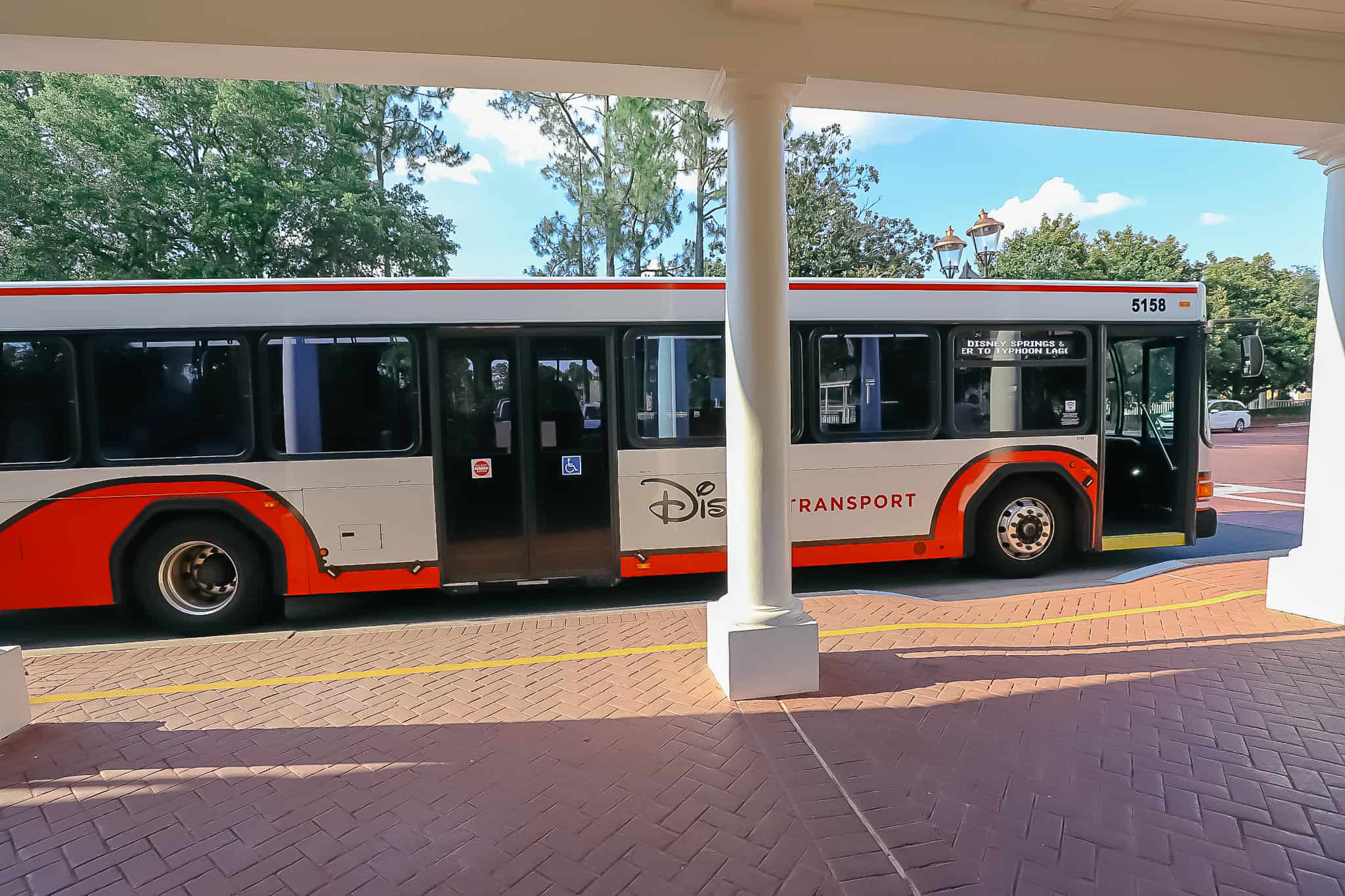 waiting at the bus stop at Disney's Beach Club 