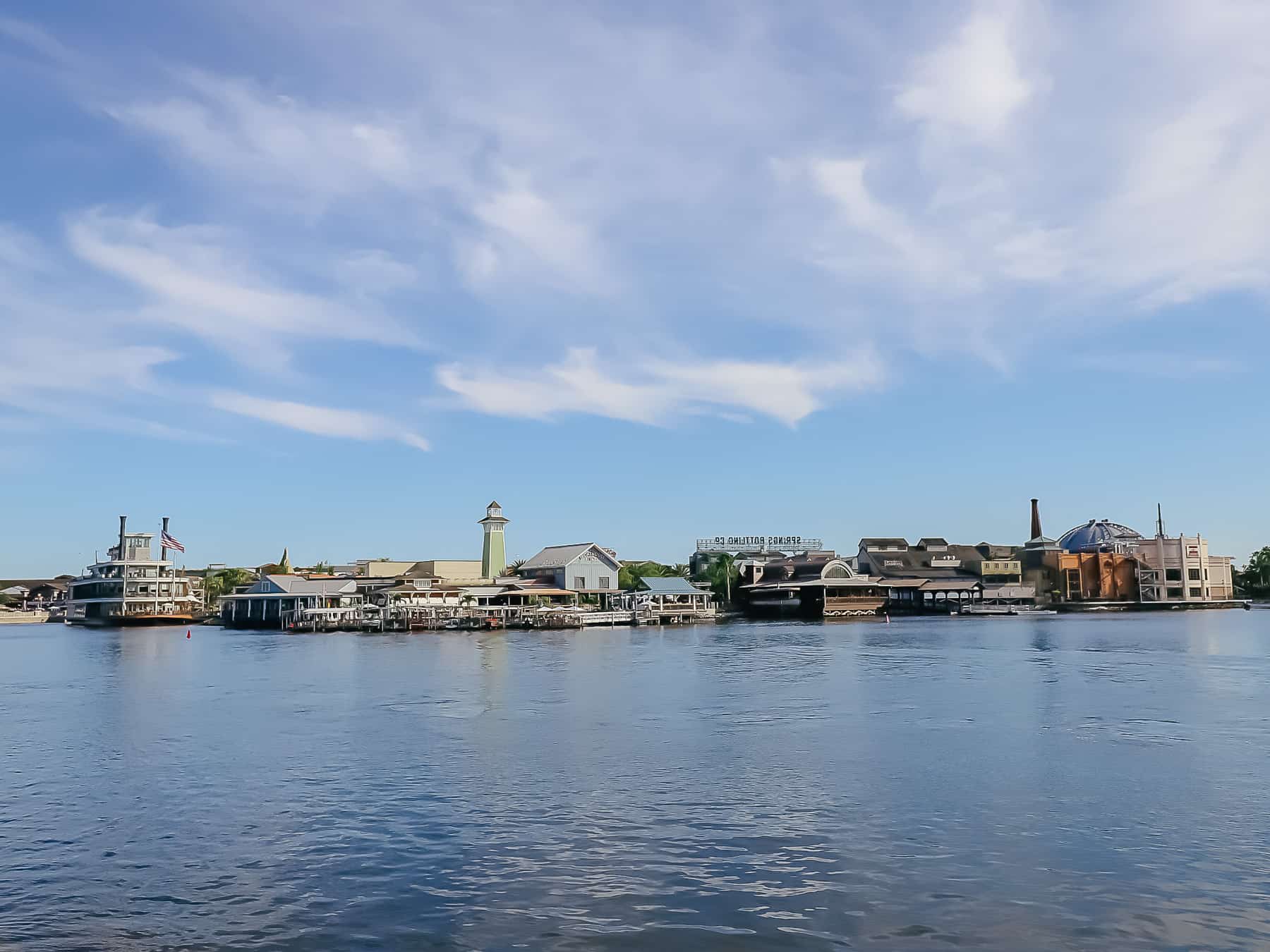 view of some of the best restaurants at Disney Springs from the water 