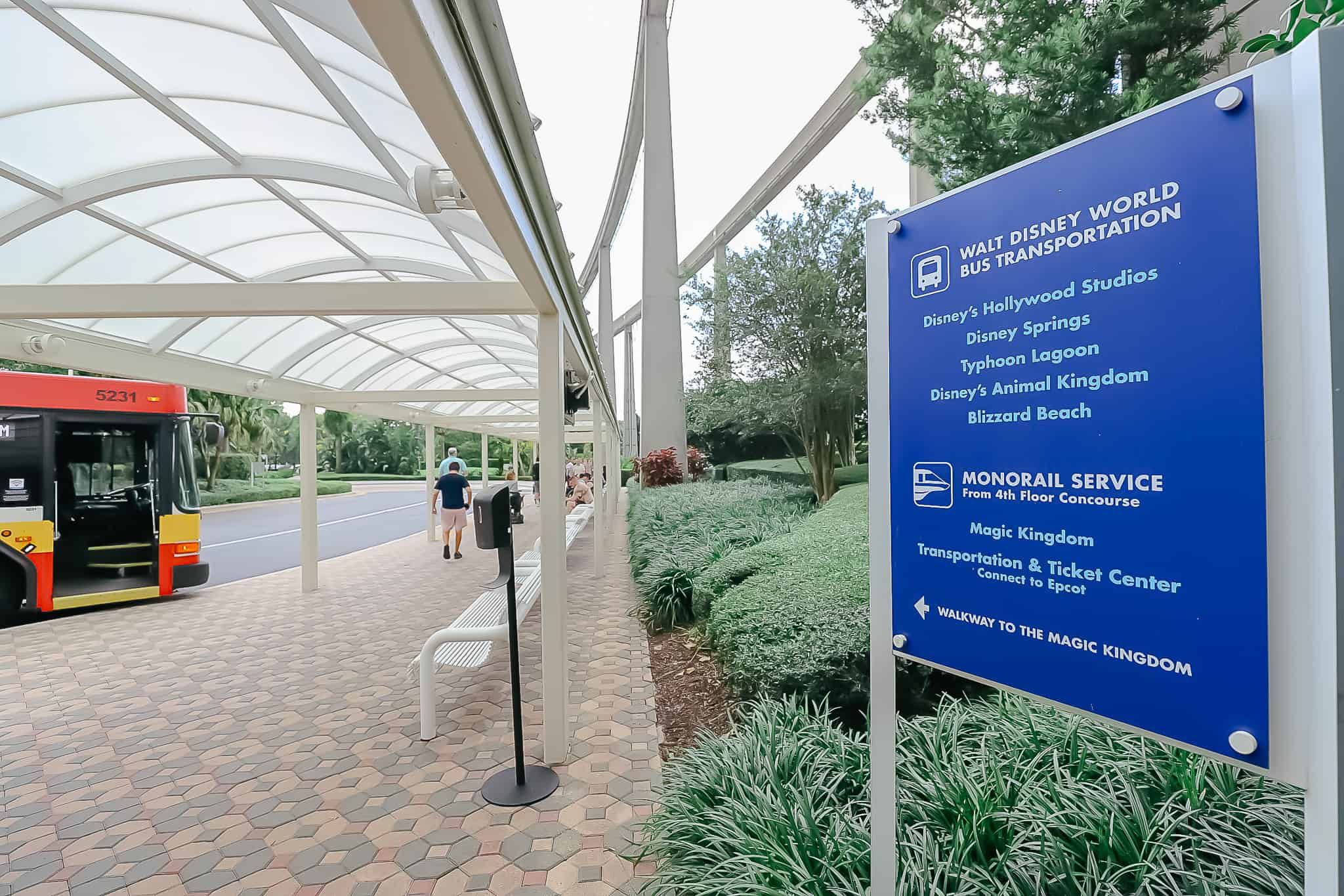 Sign that lists Disney's Contemporary Resort bus transportation, monorail service, and walkway to Magic Kingdom. 